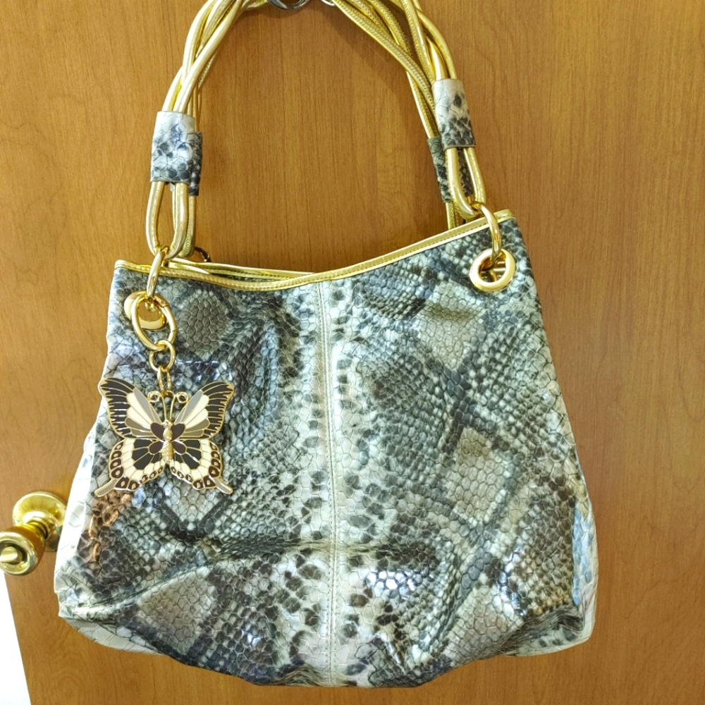 Curations faux python embossed tote.